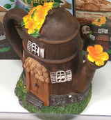 fairy watering can cottage